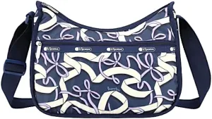 LeSportsac Hope Ribbons Classic Hobo Crossbody Bag   Cosmetic Bag, Style 7520/Color E779, Artful Lilac Bows & Graceful White Ribbons Elegantly Arranged on Classic Navy Blue Bag